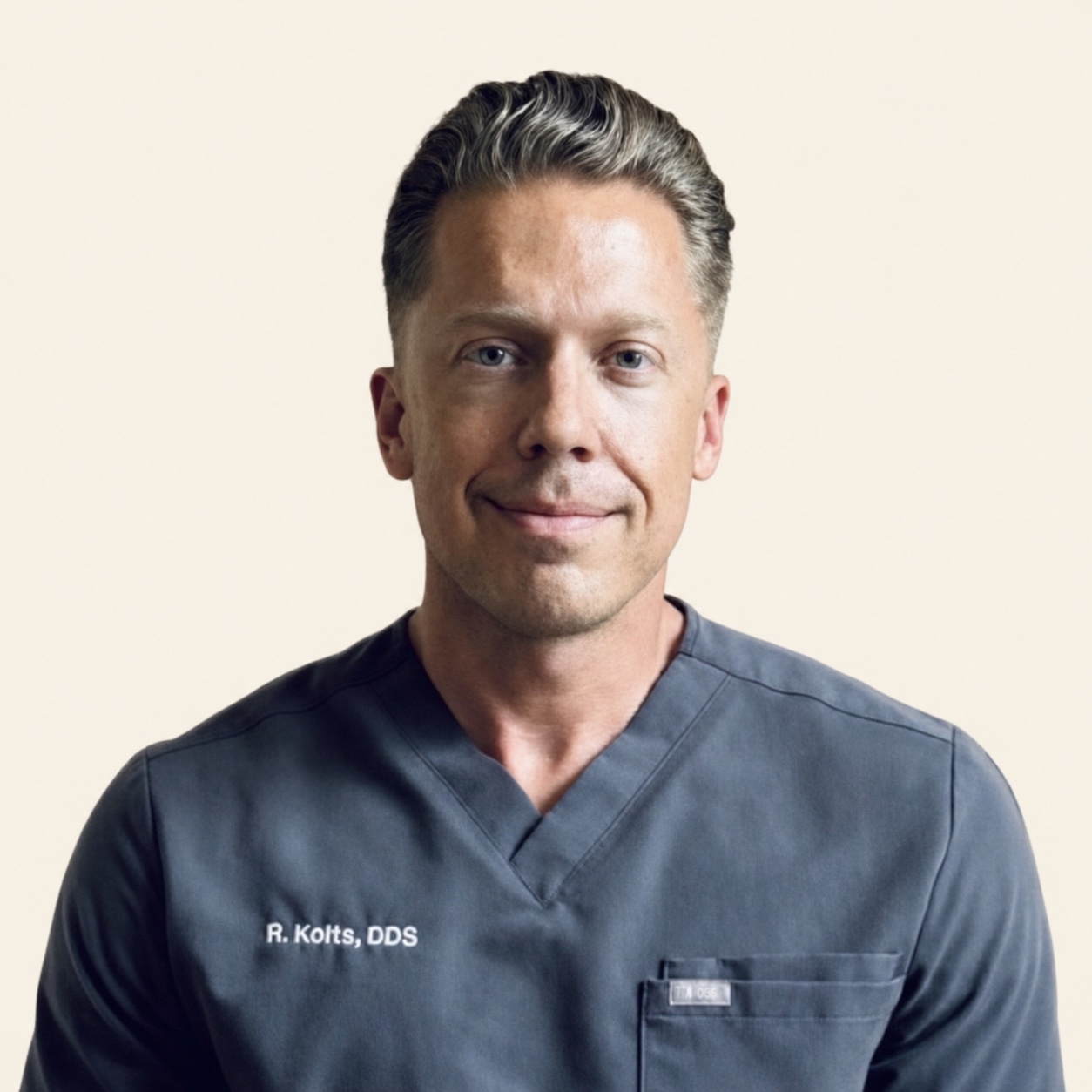 Robert J. Kolts wearing clinical scrubs